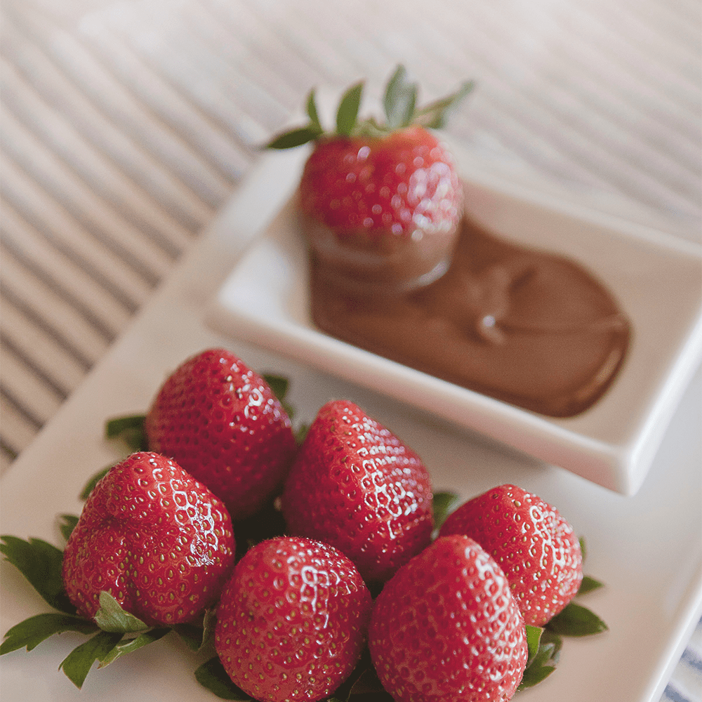 Strawberries served with a chocolate dip.