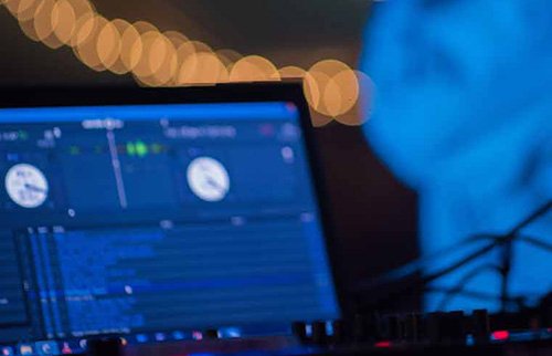 DJ software running live on screen at an event.